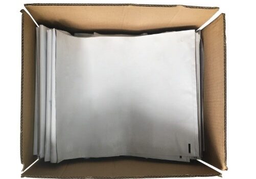 A box of aluminum foil in the middle of its packaging.